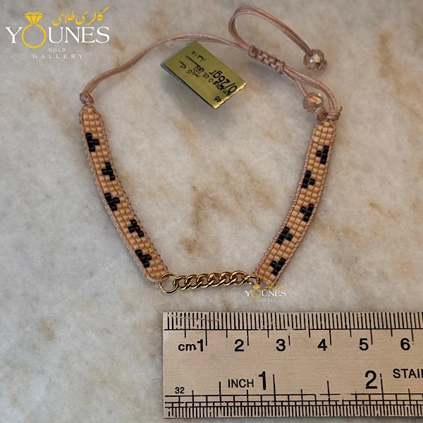 دستبند میوکی  کارتیر طلا کرم مشکی